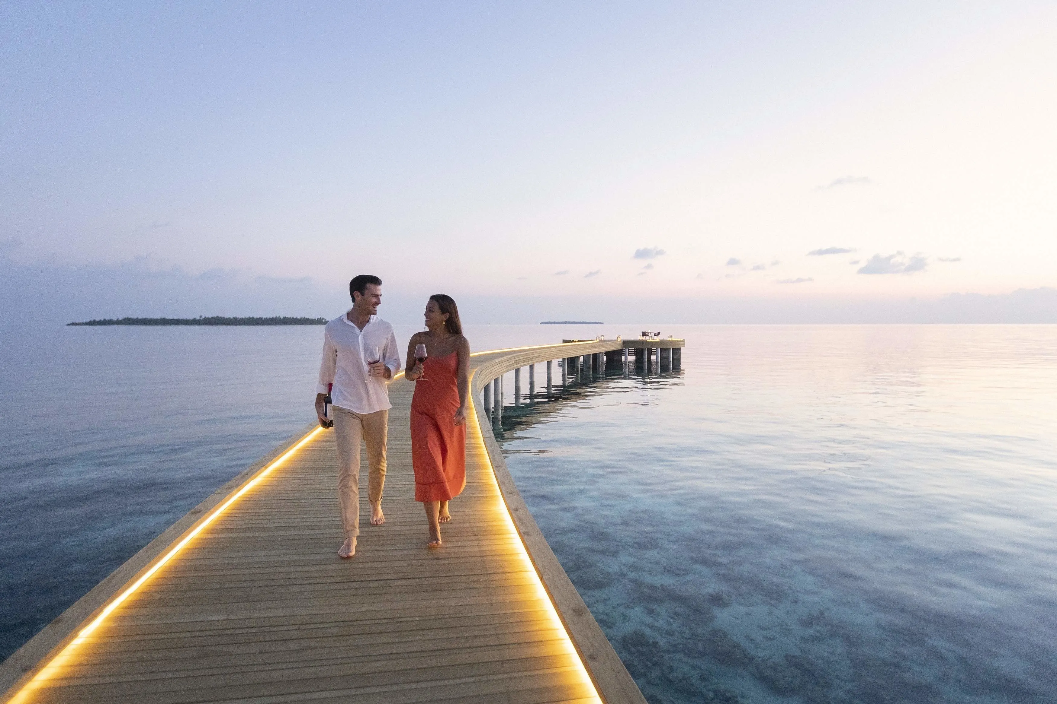 3868 maldives honeymoon resort couple snorkeling